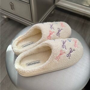 Aéropostale Cream Sherpa Slippers with Pastel Bow Embroidery